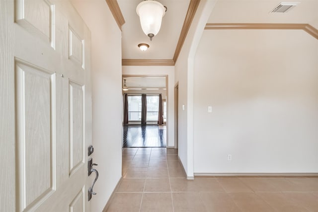 interior space featuring french doors and ornamental molding