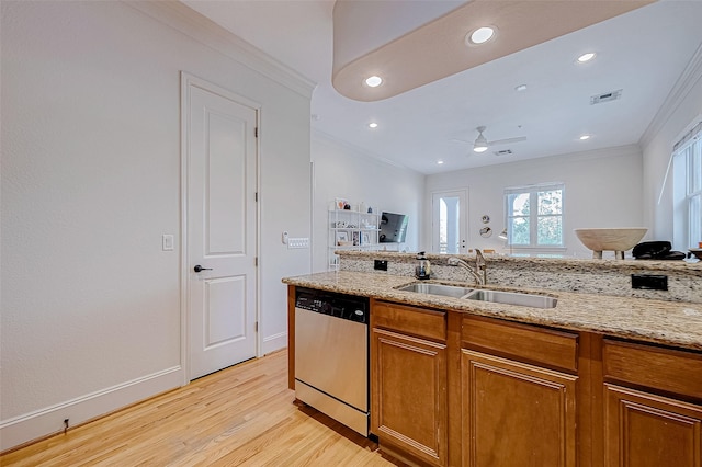 kitchen featuring ceiling fan, sink, stainless steel dishwasher, and light stone counters