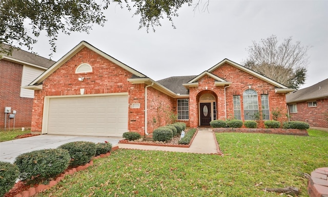 view of front property with a front yard and a garage