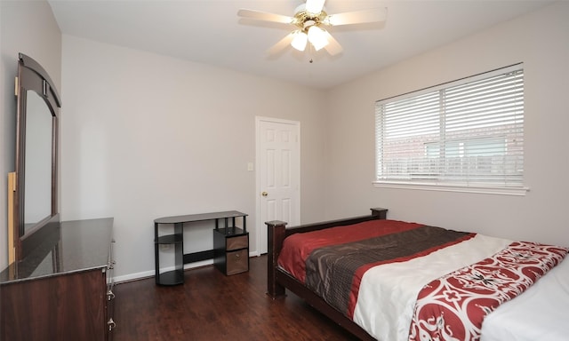 bedroom featuring ceiling fan and dark hardwood / wood-style floors