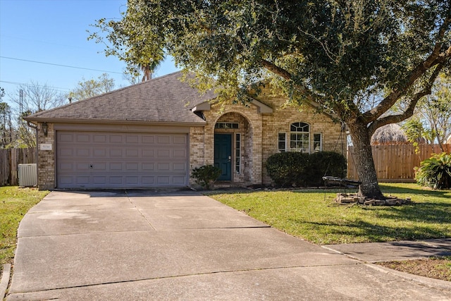 ranch-style house with a front yard and a garage