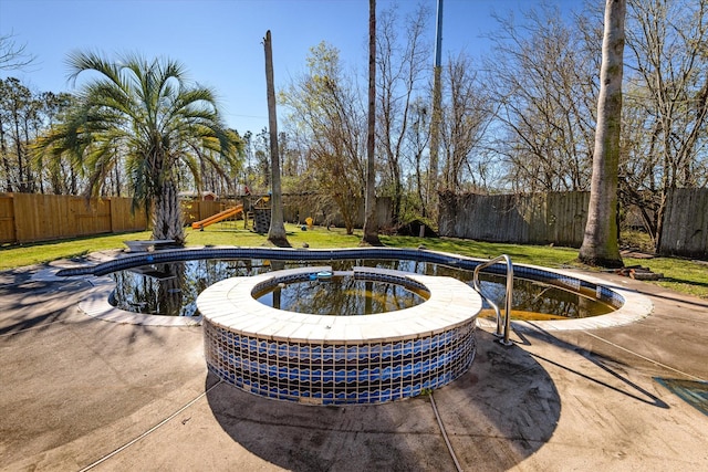 view of pool featuring a patio area and a playground