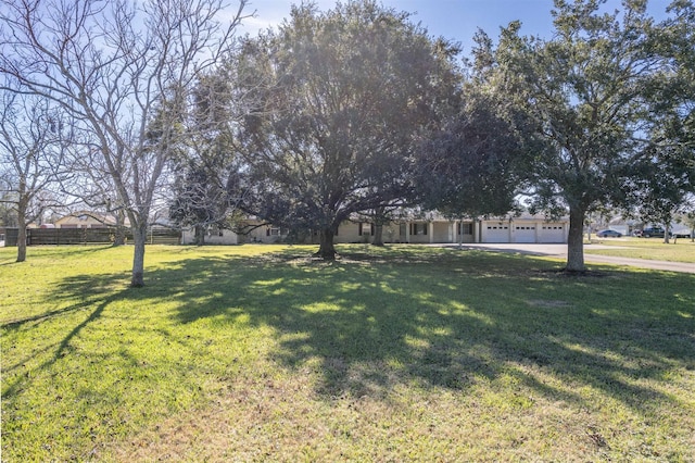 view of yard featuring a garage