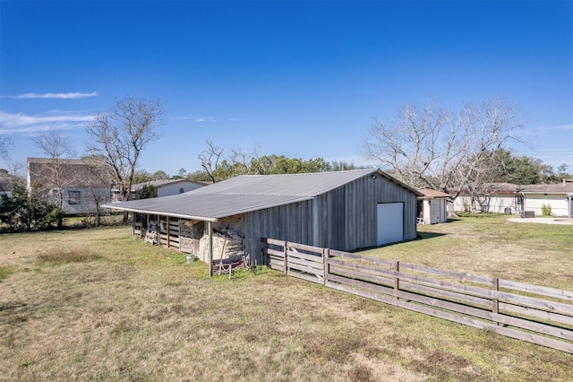 view of outbuilding with a garage