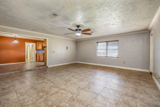 unfurnished room with tile patterned flooring, ceiling fan, and ornamental molding