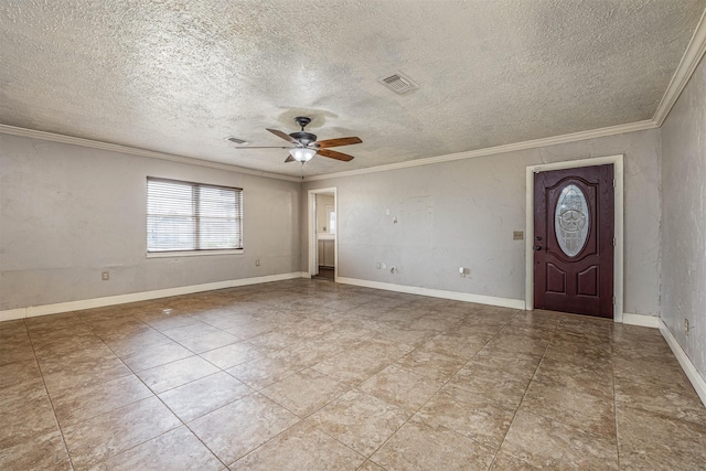 entryway featuring ceiling fan, a textured ceiling, and ornamental molding