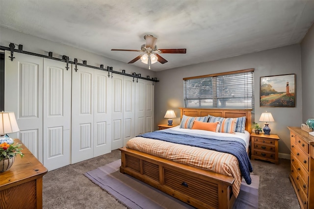 carpeted bedroom featuring ceiling fan