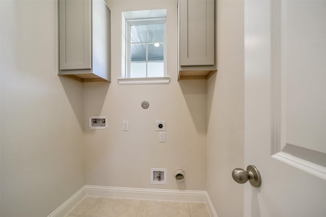 washroom featuring hookup for an electric dryer, hookup for a gas dryer, hookup for a washing machine, and baseboards
