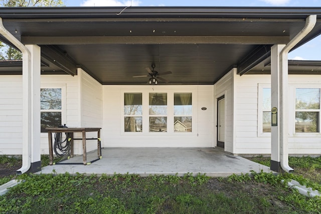 view of patio featuring ceiling fan