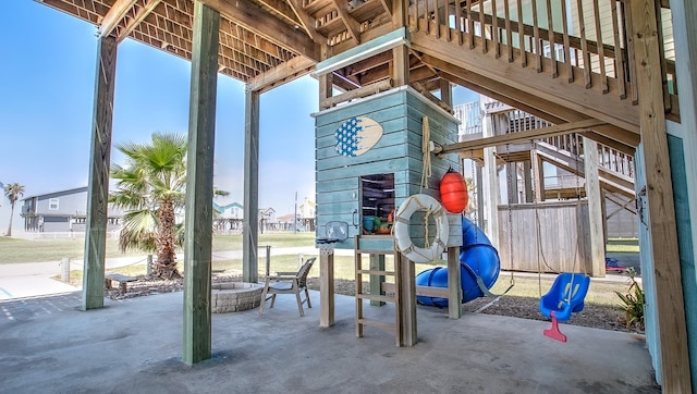 view of patio featuring a playground