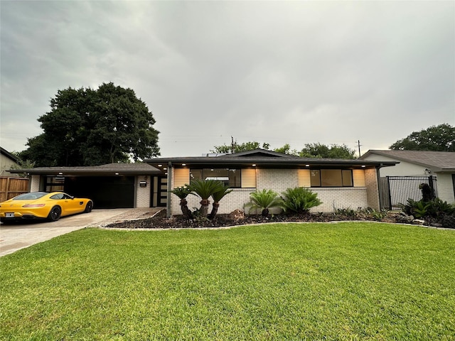 view of front facade featuring a front lawn and a carport