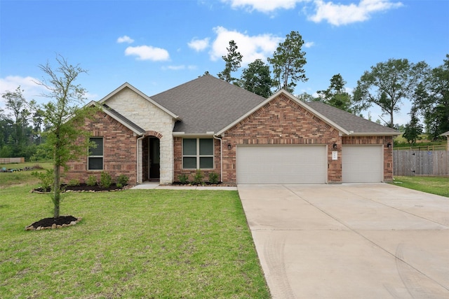 craftsman-style house with a front yard and a garage