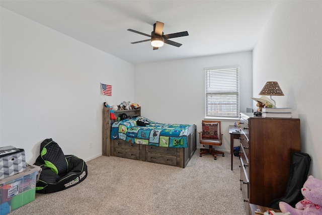 carpeted bedroom featuring ceiling fan