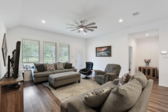 living room featuring ceiling fan and hardwood / wood-style flooring