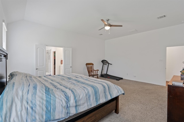 bedroom featuring vaulted ceiling, light colored carpet, and ceiling fan