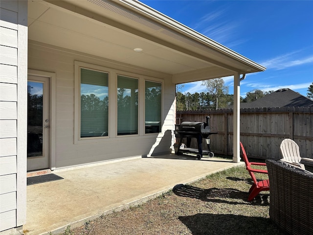 view of patio with a grill