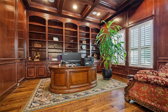 home office with wood walls, beamed ceiling, crown molding, coffered ceiling, and built in features