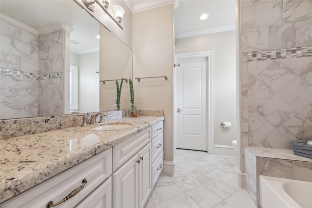 bathroom with vanity and ornamental molding