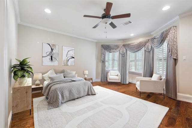 bedroom with ceiling fan, wood-type flooring, and crown molding