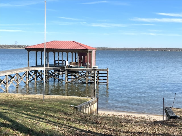 view of dock with a water view