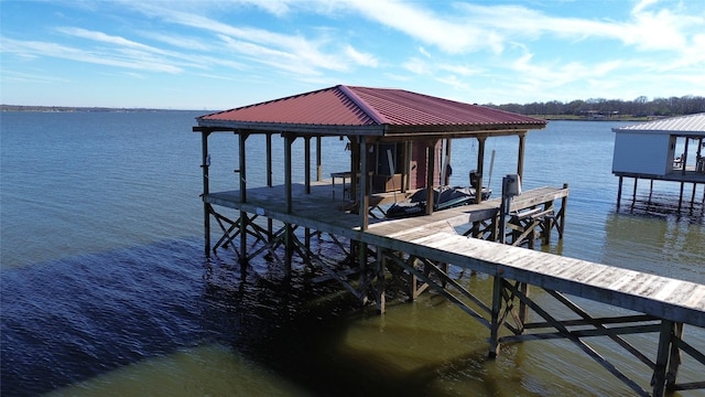 dock area with a water view