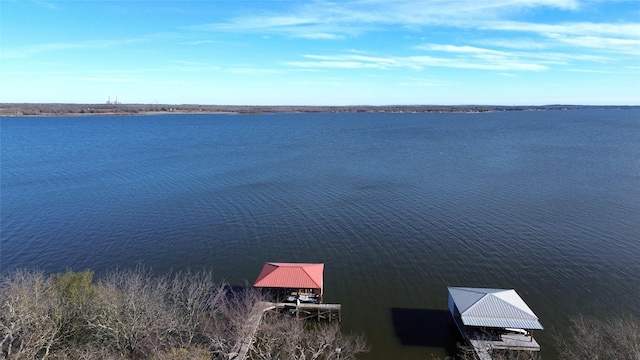 exterior space with a water view