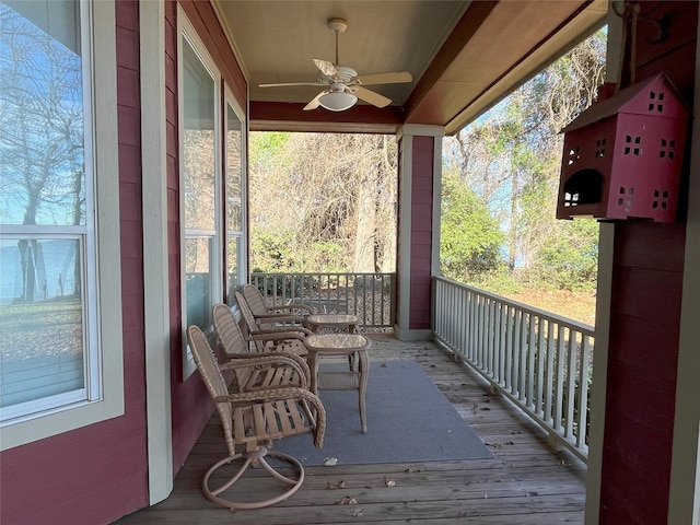 deck featuring ceiling fan and covered porch