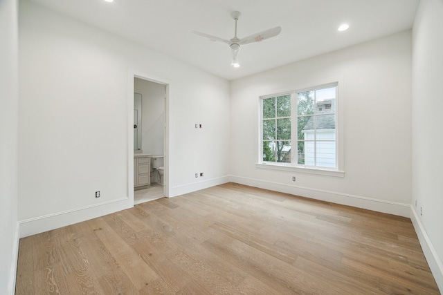 empty room featuring light hardwood / wood-style floors and ceiling fan