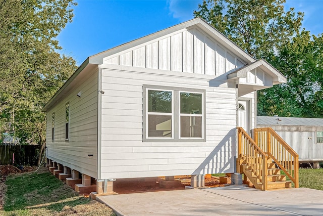 back of property featuring a patio area