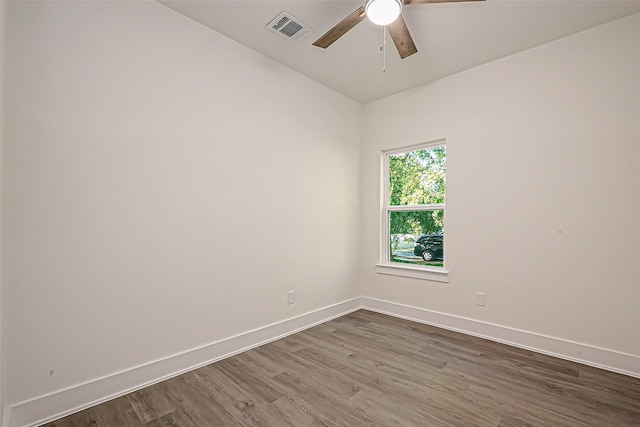 empty room featuring ceiling fan and wood-type flooring