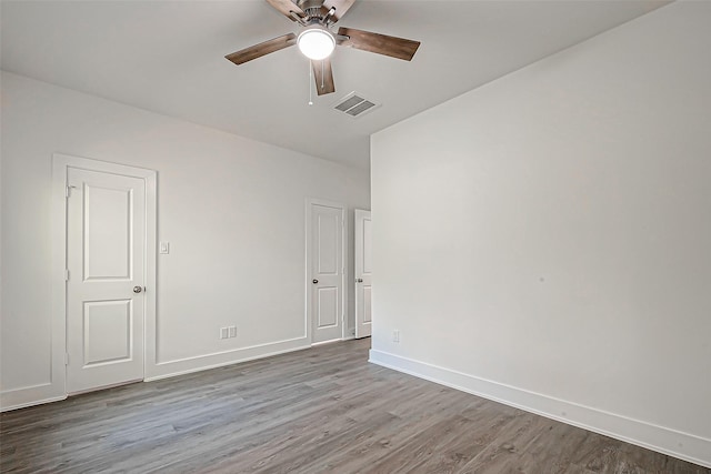 unfurnished room featuring hardwood / wood-style floors and ceiling fan