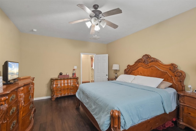 bedroom with ceiling fan and dark wood-type flooring