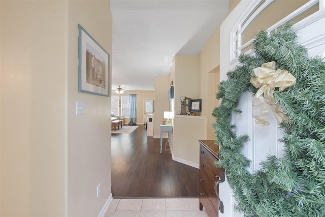 hallway with light tile patterned floors