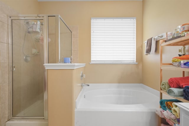 bathroom featuring plus walk in shower