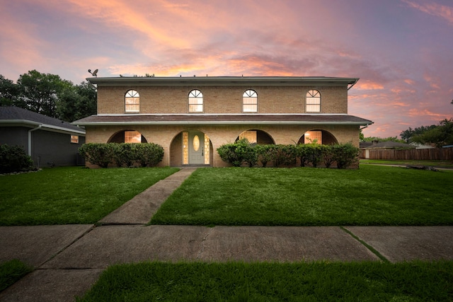 view of front of house with a lawn