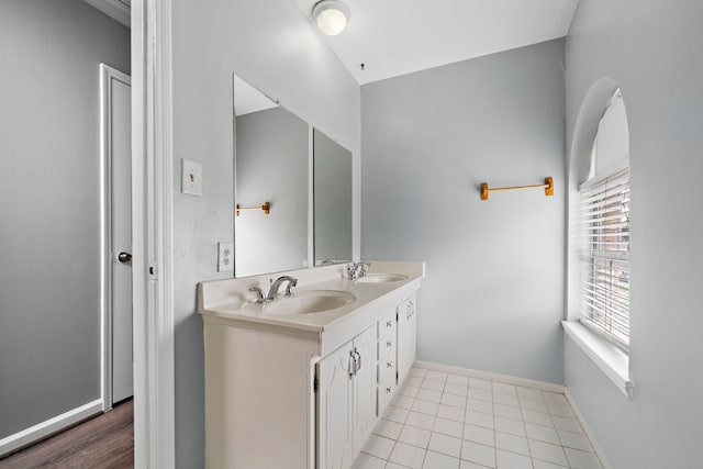 bathroom featuring vanity and tile patterned flooring