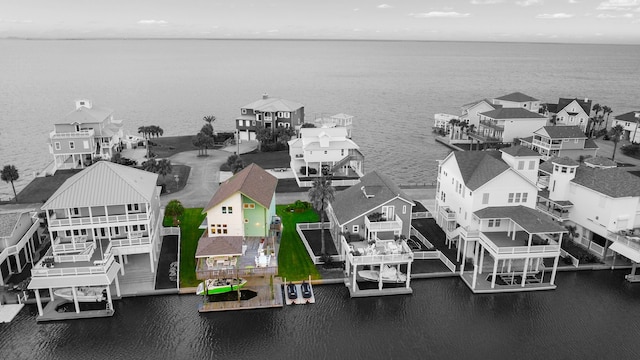 aerial view with a residential view and a water view