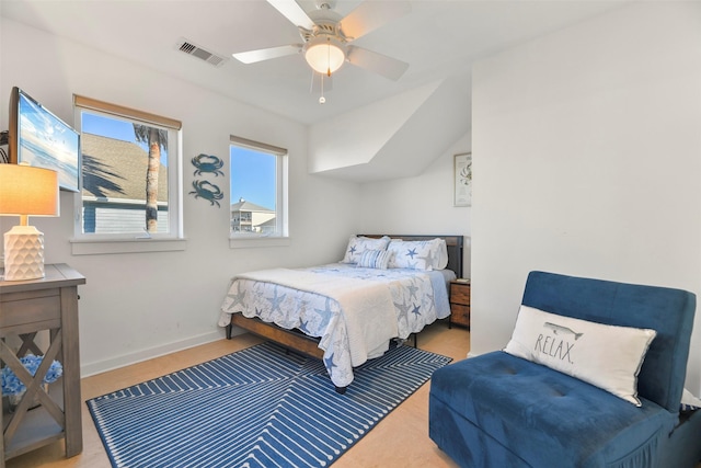 bedroom featuring visible vents, baseboards, and ceiling fan