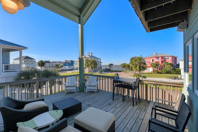 22823 Chiquita St, Galveston, TX 77554 - wooden terrace featuring a residential view