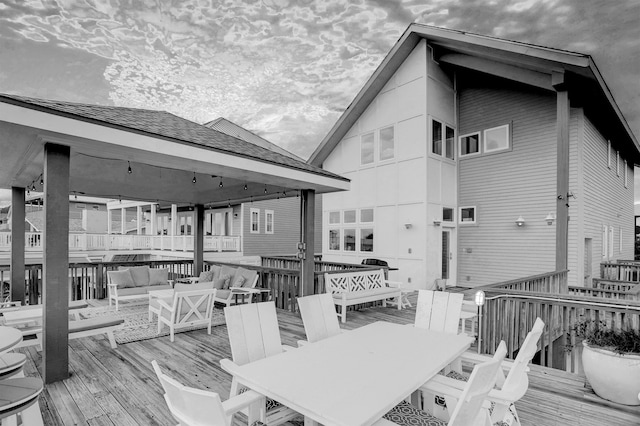 22823 Chiquita St, Galveston, TX 77554 - wooden terrace featuring an outdoor hangout area and outdoor dining space