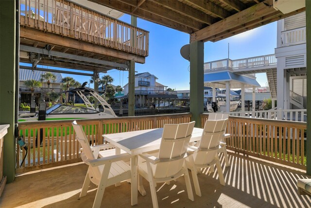22823 Chiquita St, Galveston, TX 77554 - wooden deck featuring outdoor dining space