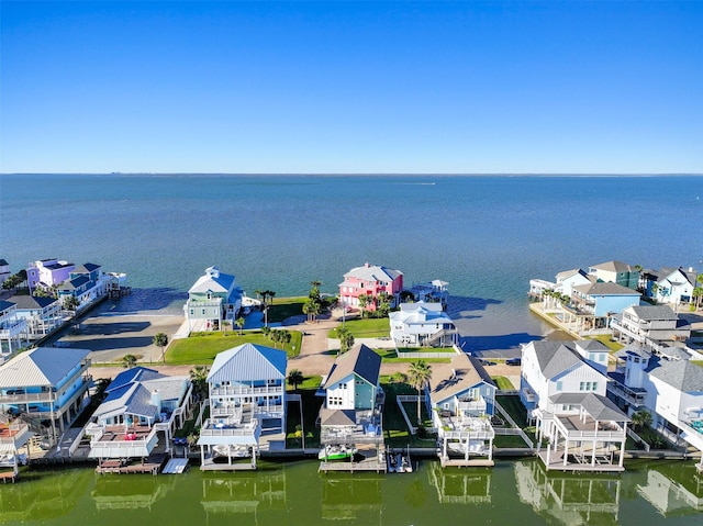 aerial view with a residential view and a water view