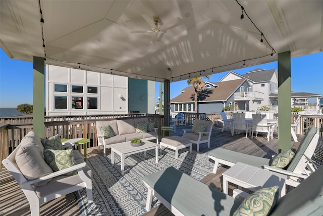 view of patio with an outdoor hangout area, outdoor dining area, and ceiling fan