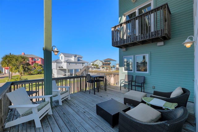 wooden terrace with a residential view