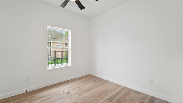 empty room featuring light hardwood / wood-style floors and ceiling fan