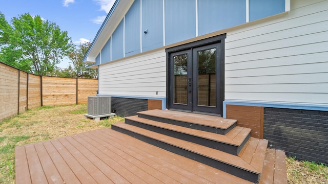 wooden terrace with central AC and french doors