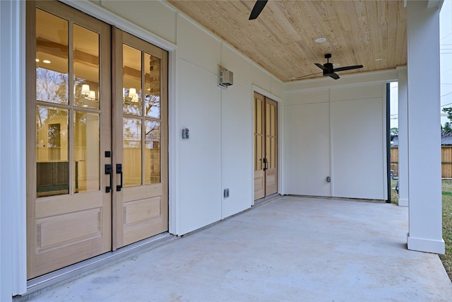 view of patio featuring ceiling fan and french doors