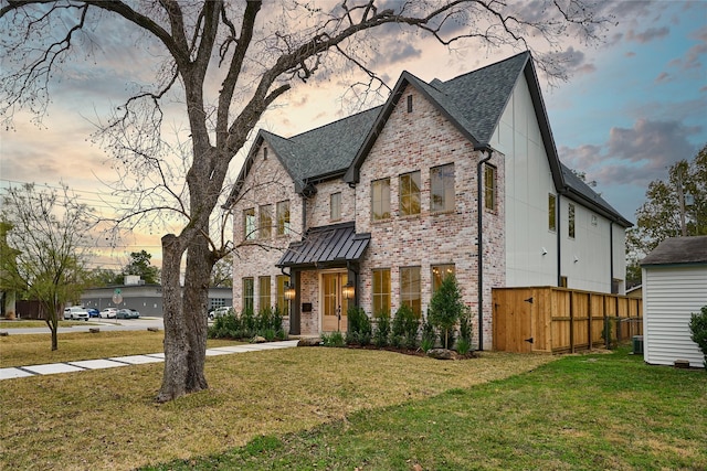 view of front facade with a yard