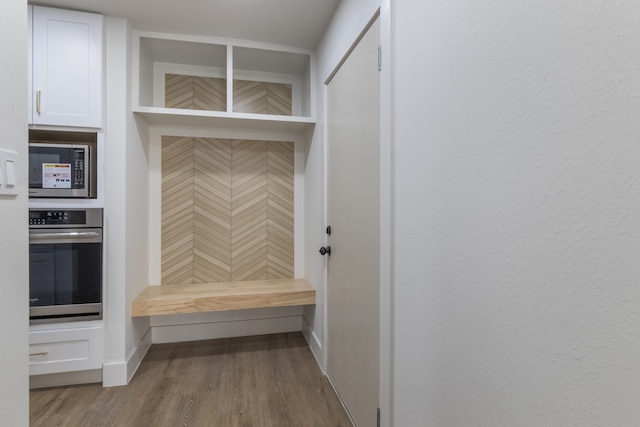 mudroom featuring hardwood / wood-style floors