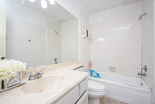 bathroom featuring shower / tub combination, vanity, and toilet